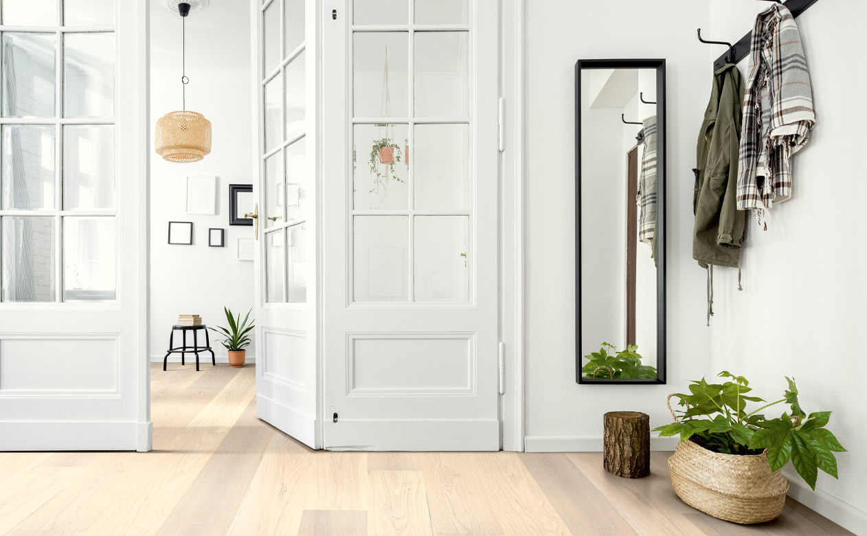 light wood flooring in mudroom